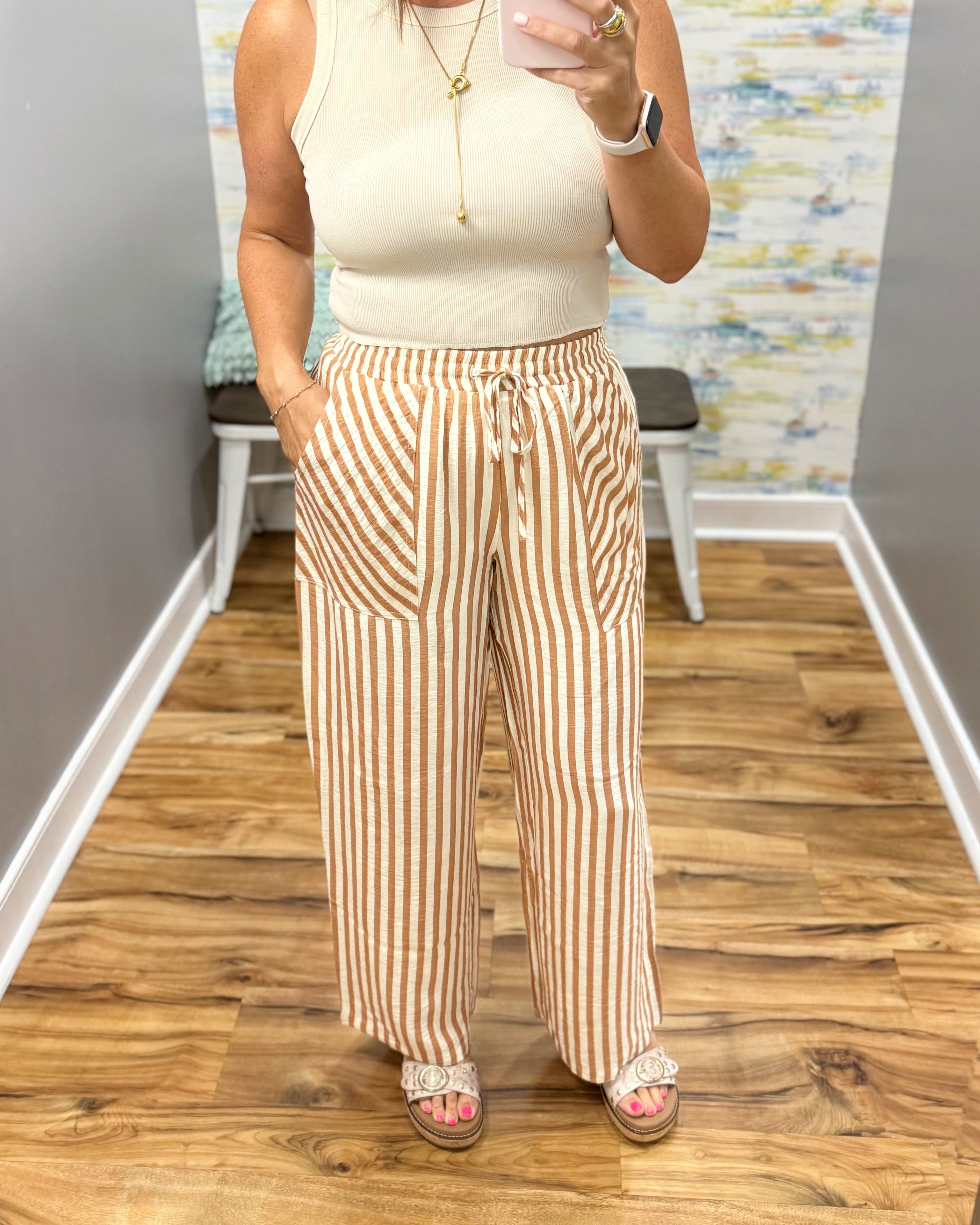 woman wearing stripe pants.