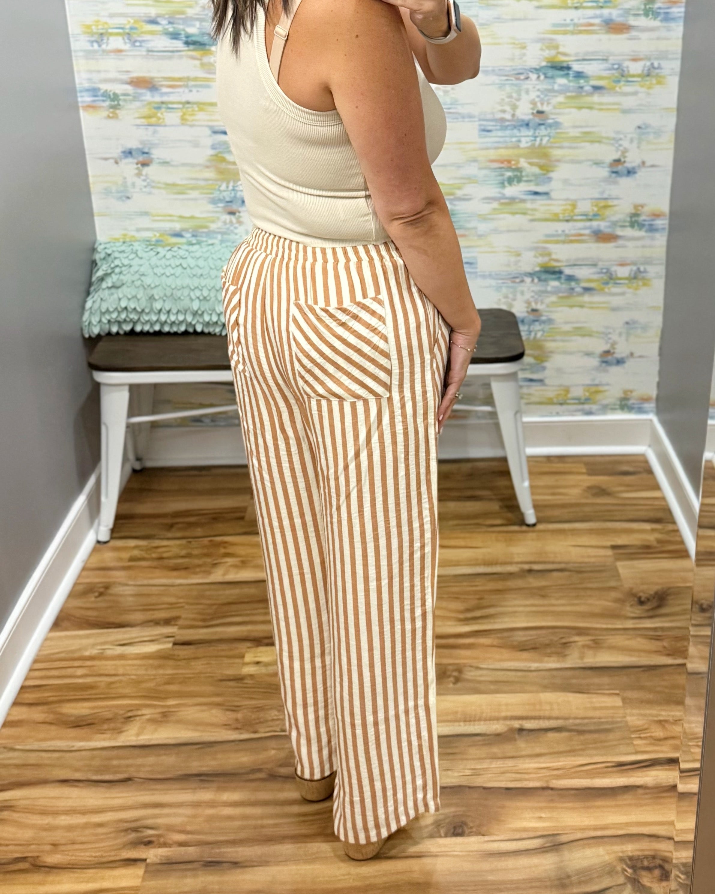 woman wearing stripe pants.