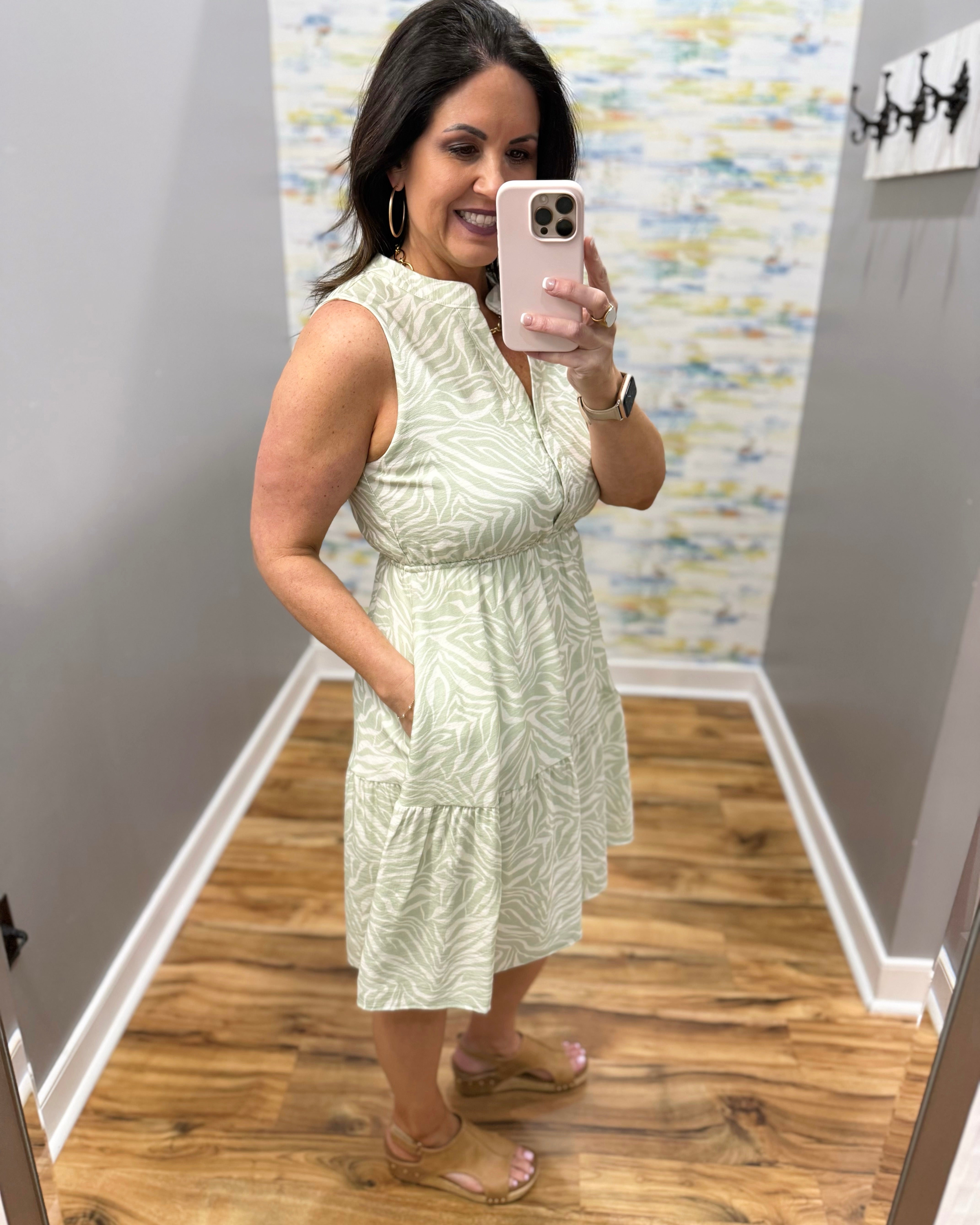 woman in sage tropical dress