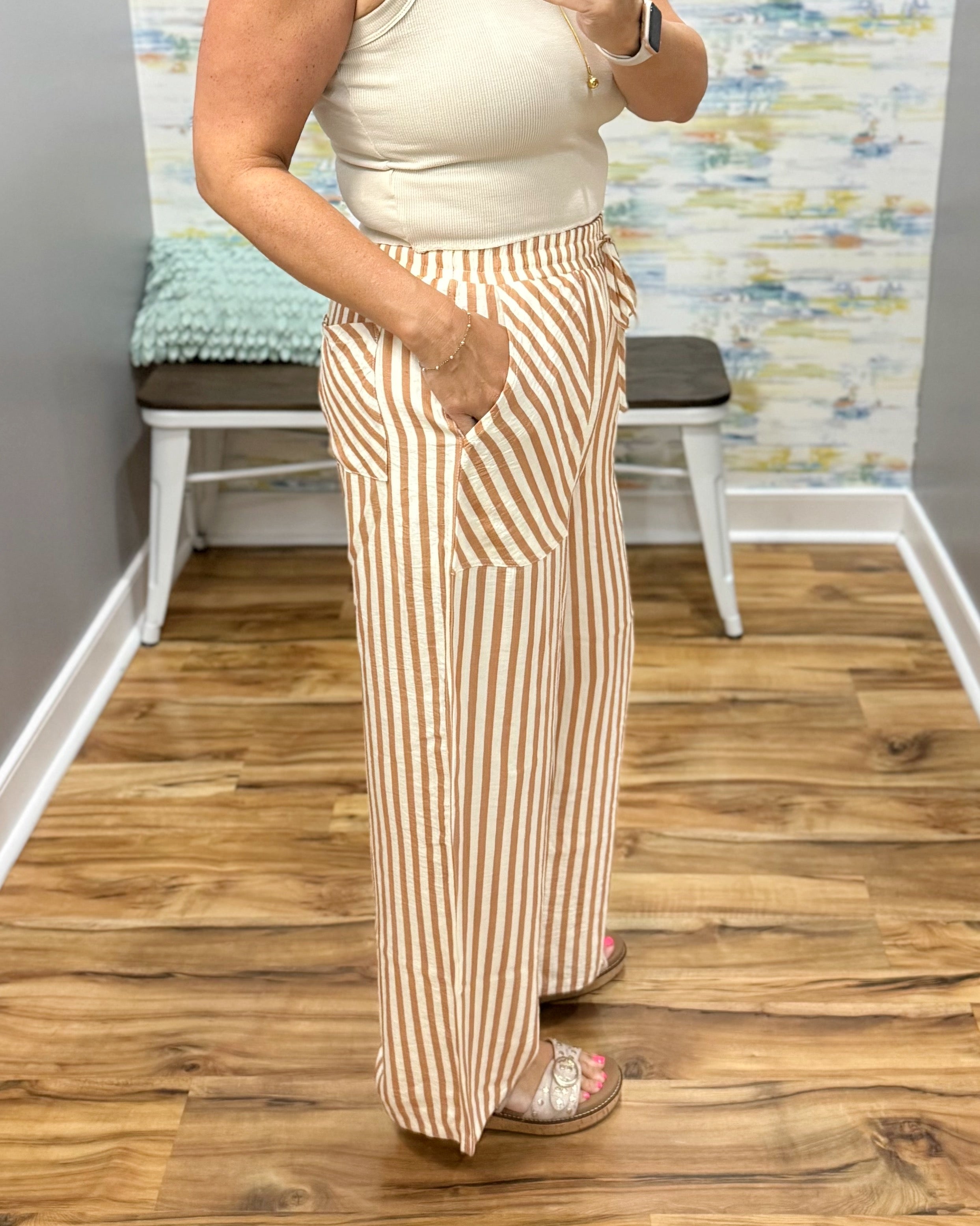 woman wearing stripe pants.