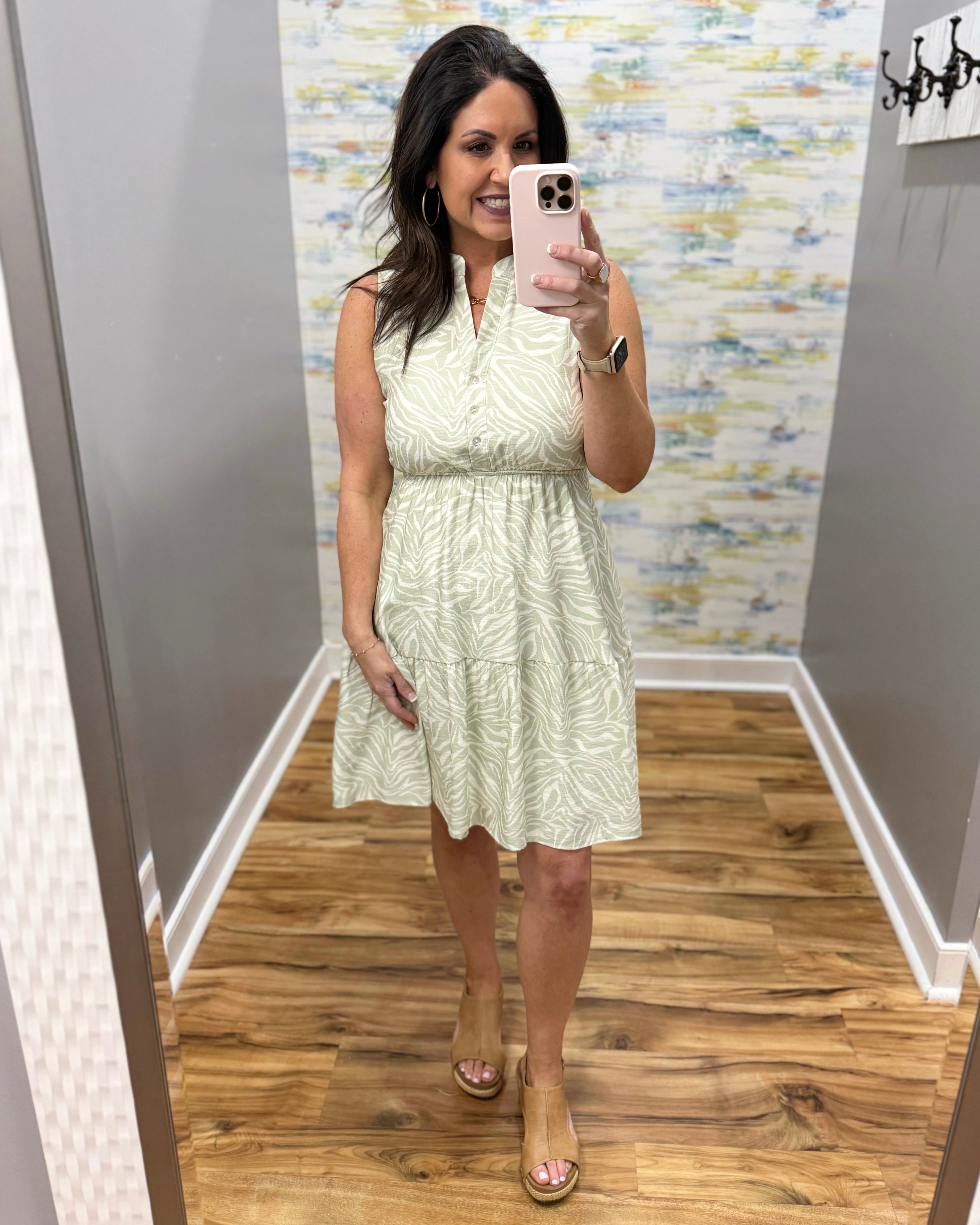 woman in sage tropical dress