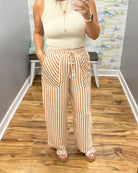 woman wearing stripe pants.