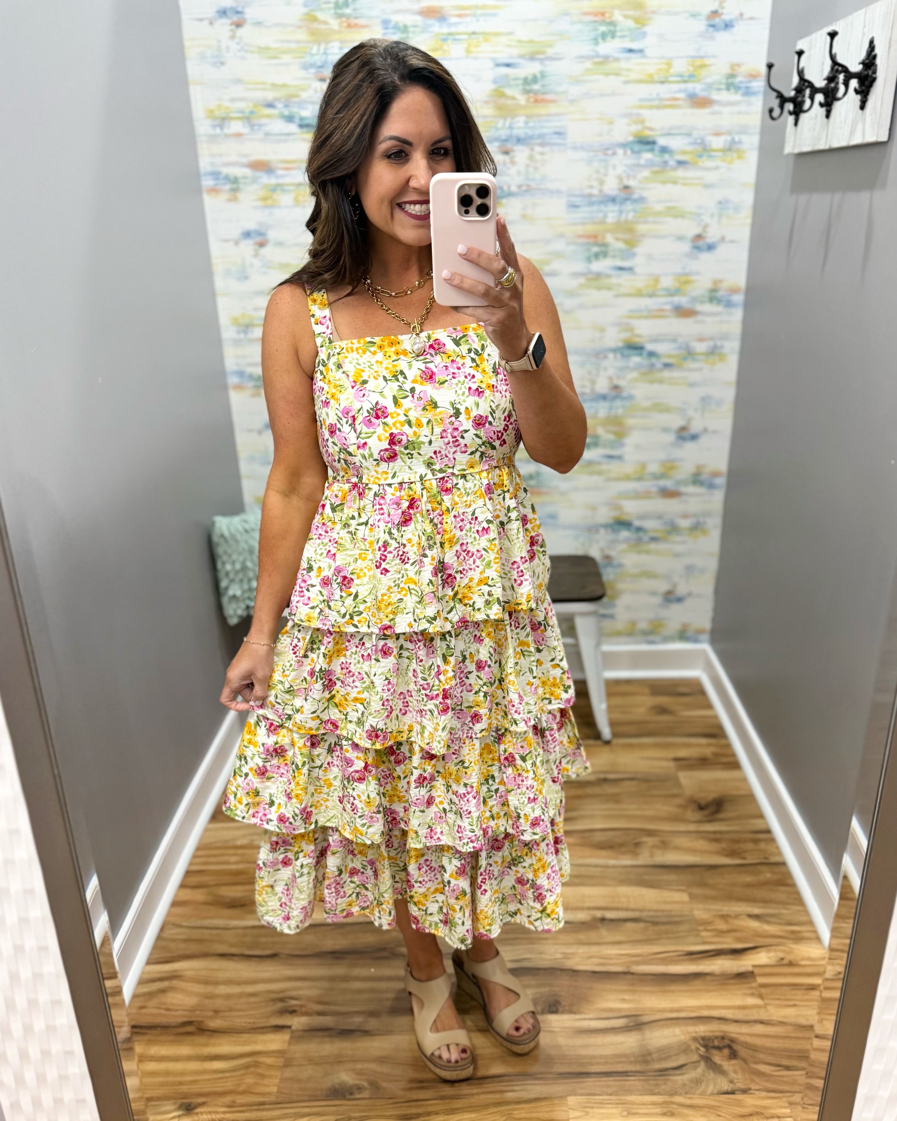 woman wearing floral maxi dress.