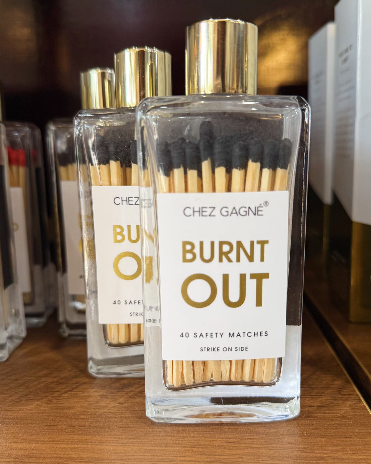 burnt out glass bottle of 40 safety matches.
