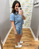 woman wearing denim top with matching denim skort
