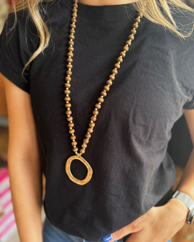 Dark Brown Beaded Necklace with Circle Pendant