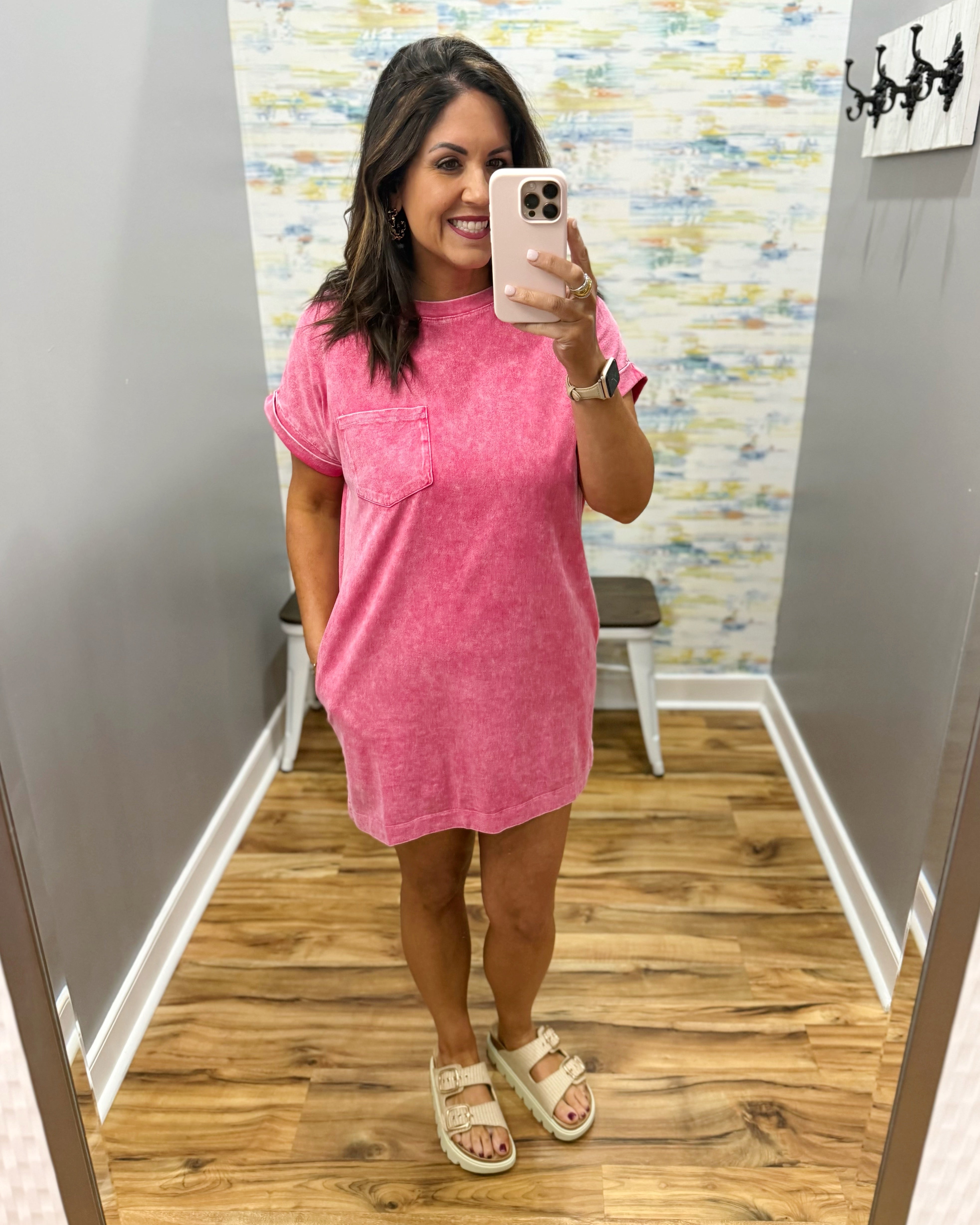 woman wearing red t-shirt dress with sandals. 