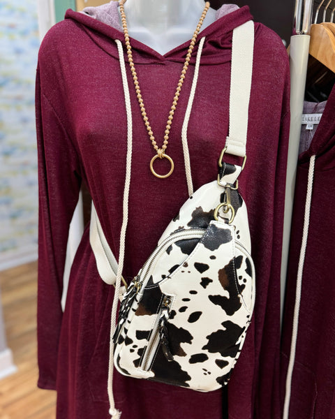 Nikki Sling Bag in Cow Print