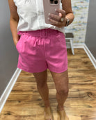 woman wearing pink shorts
