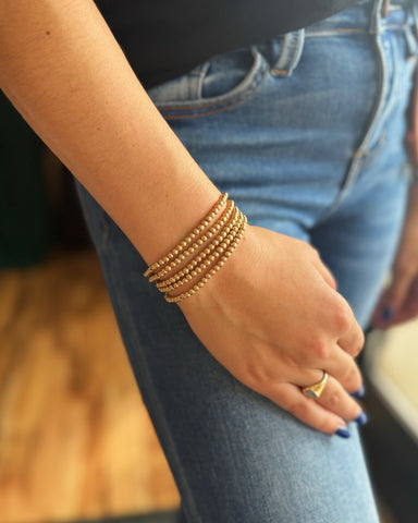 Worn Gold Multi Size Beaded Bracelet