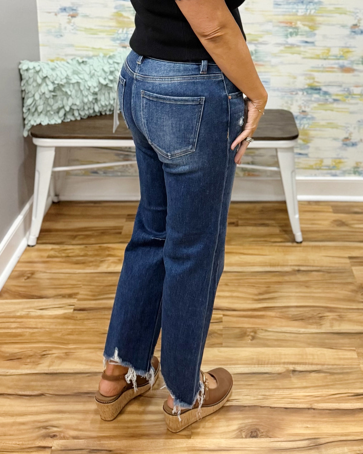 Risen crop straight jeans in dark wash.