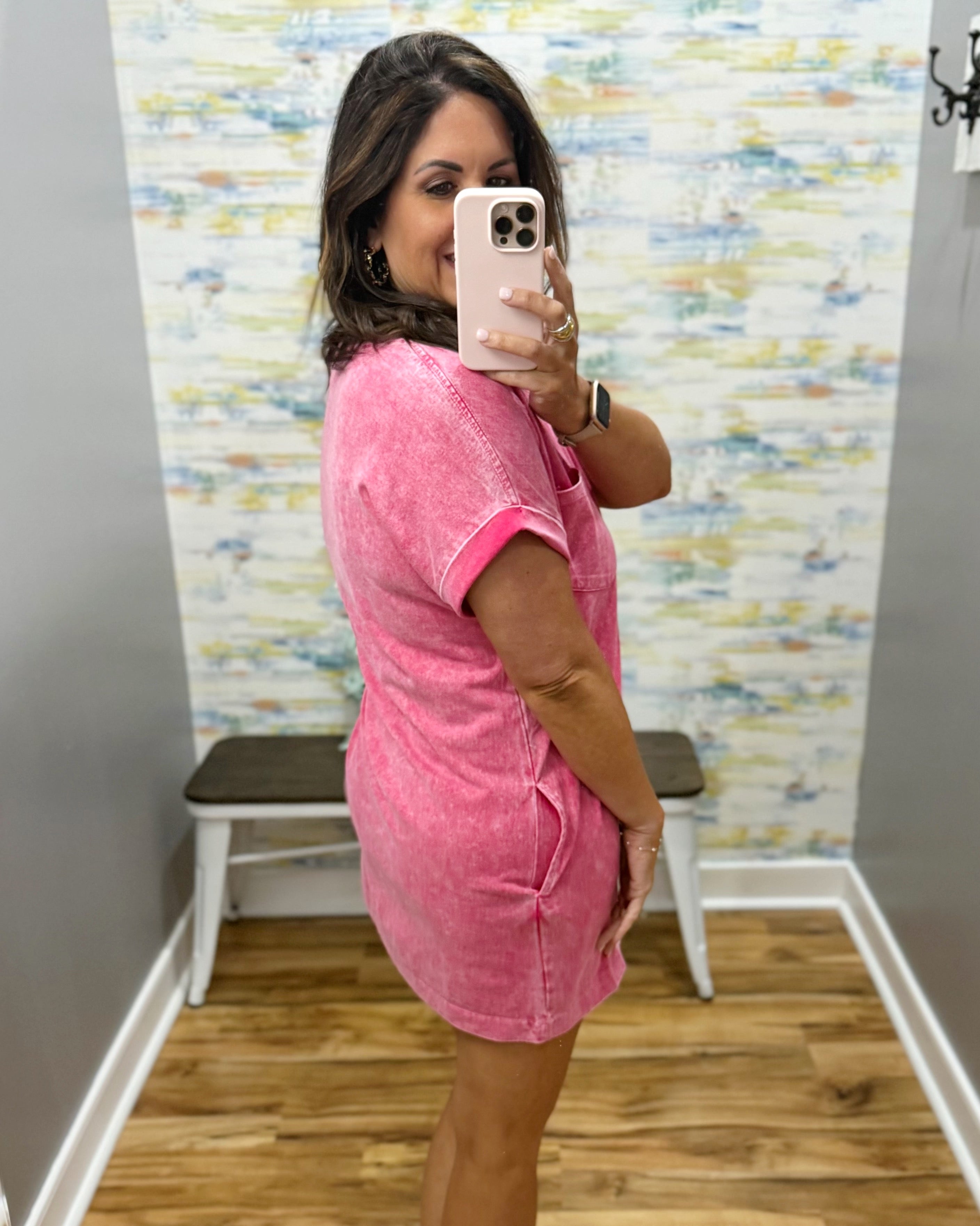 woman wearing red t-shirt dress with sandals. 