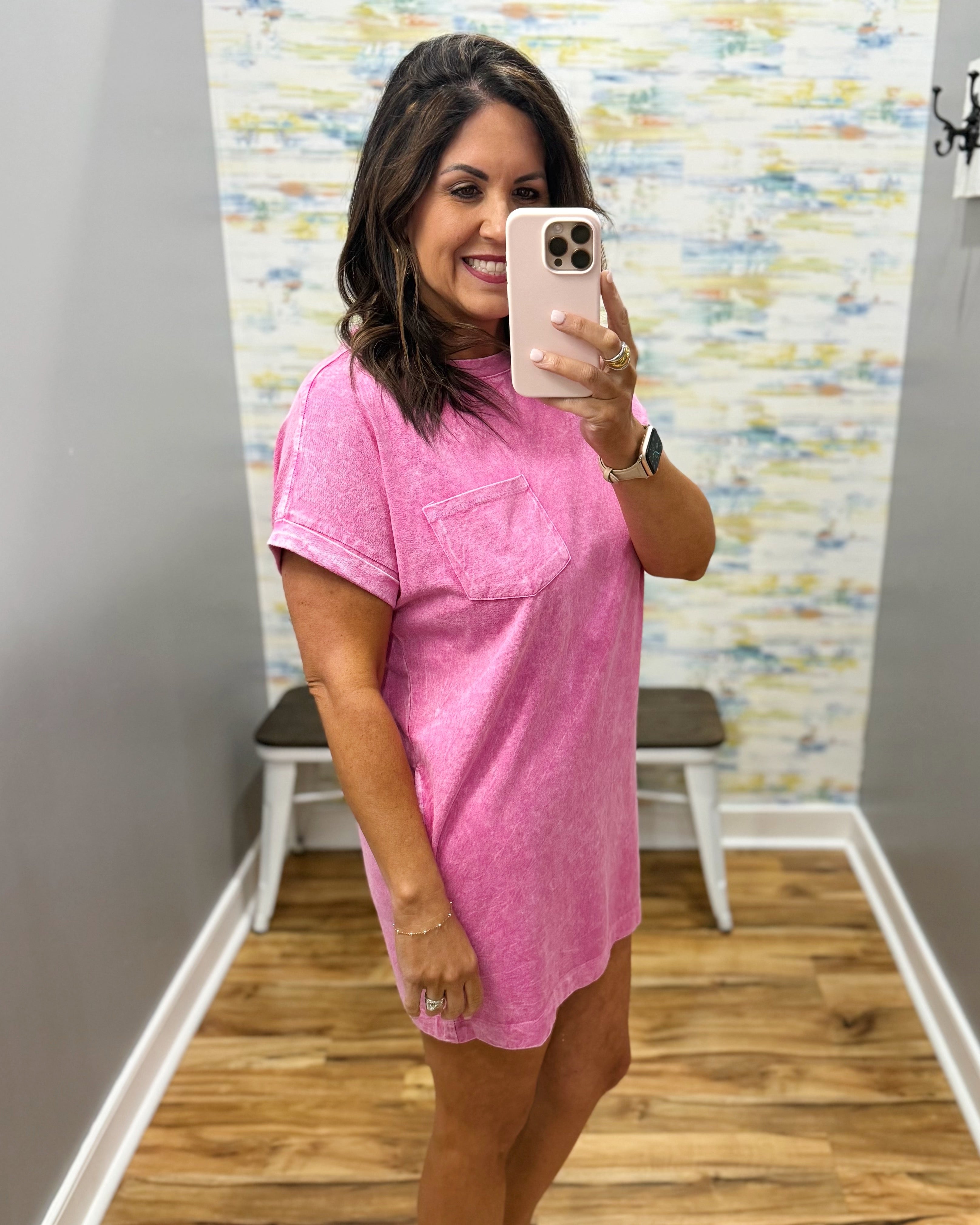 woman wearing hot pink t-shirt dress with sandals. 