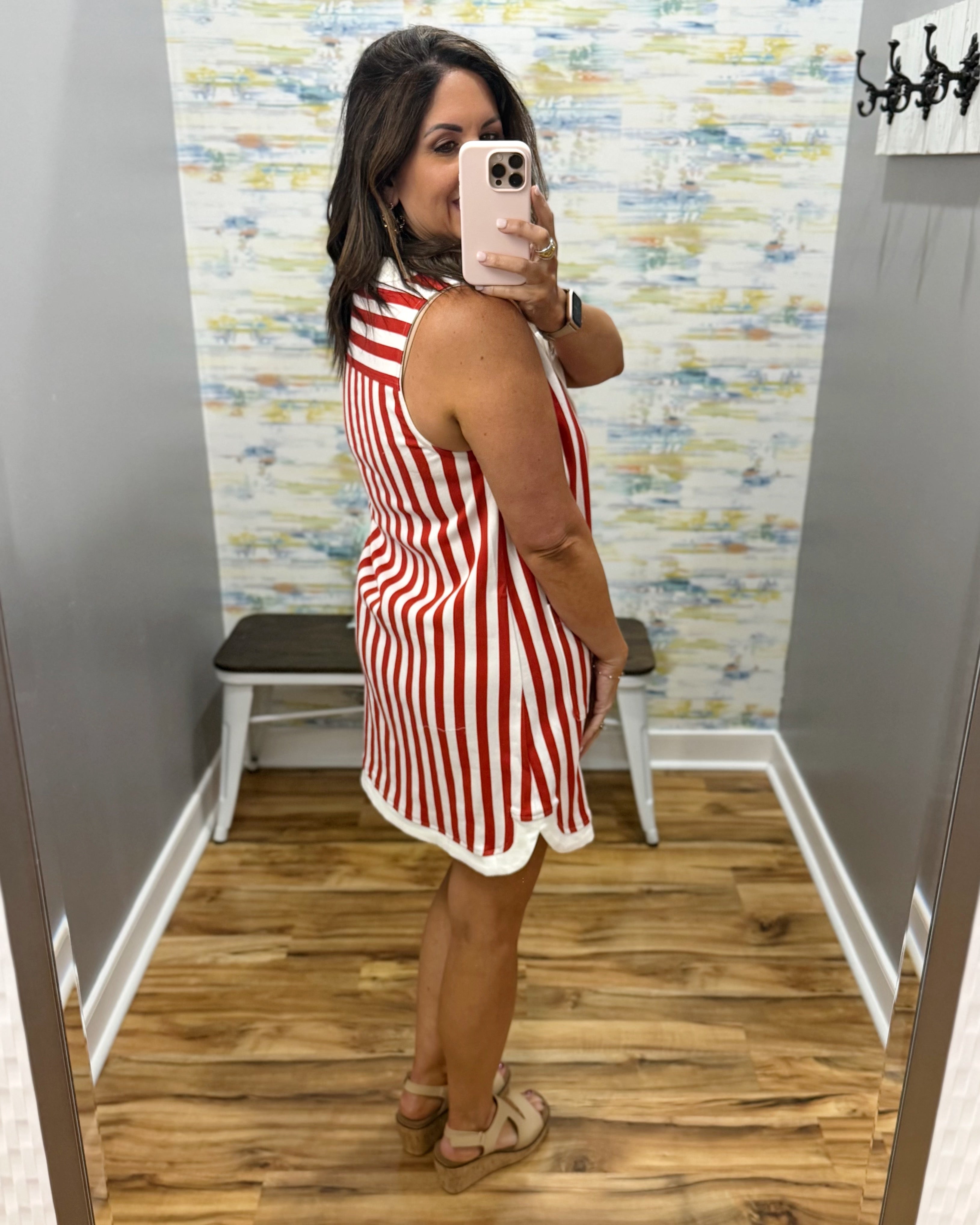 woman wearing red and white stripe dress.
