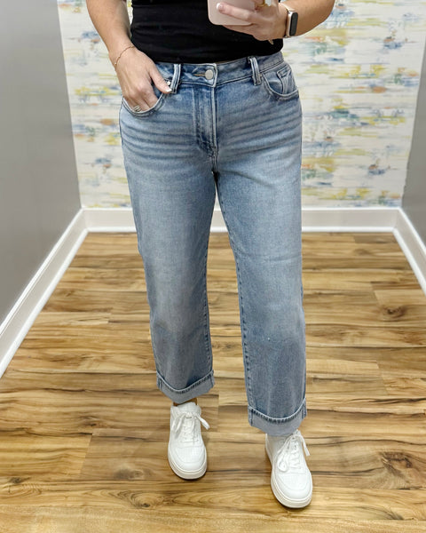 woman wearing Risen Boyfriend style Jeans in a light wash.
