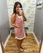woman wearing red and white stripe dress.