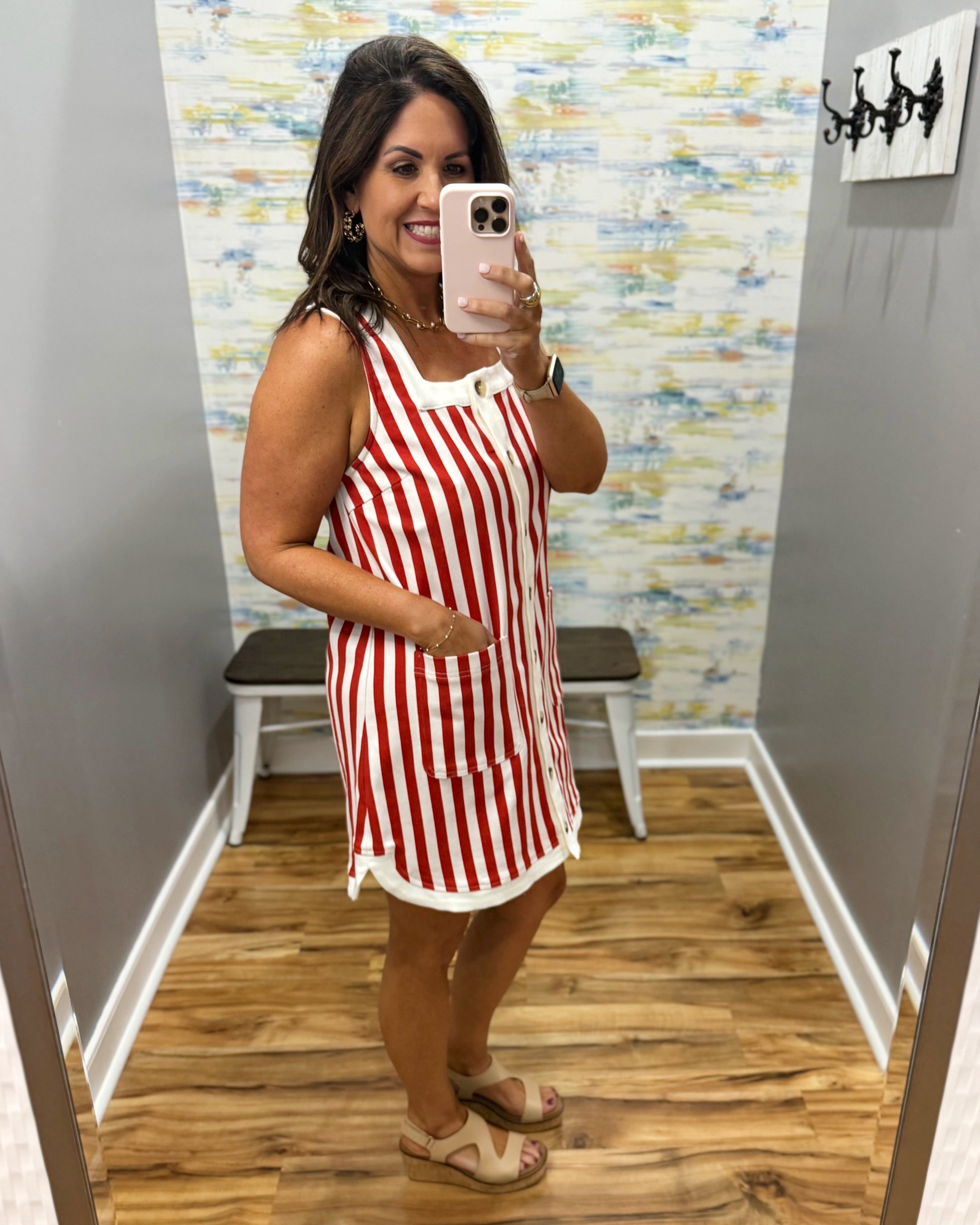woman wearing red and white stripe dress.