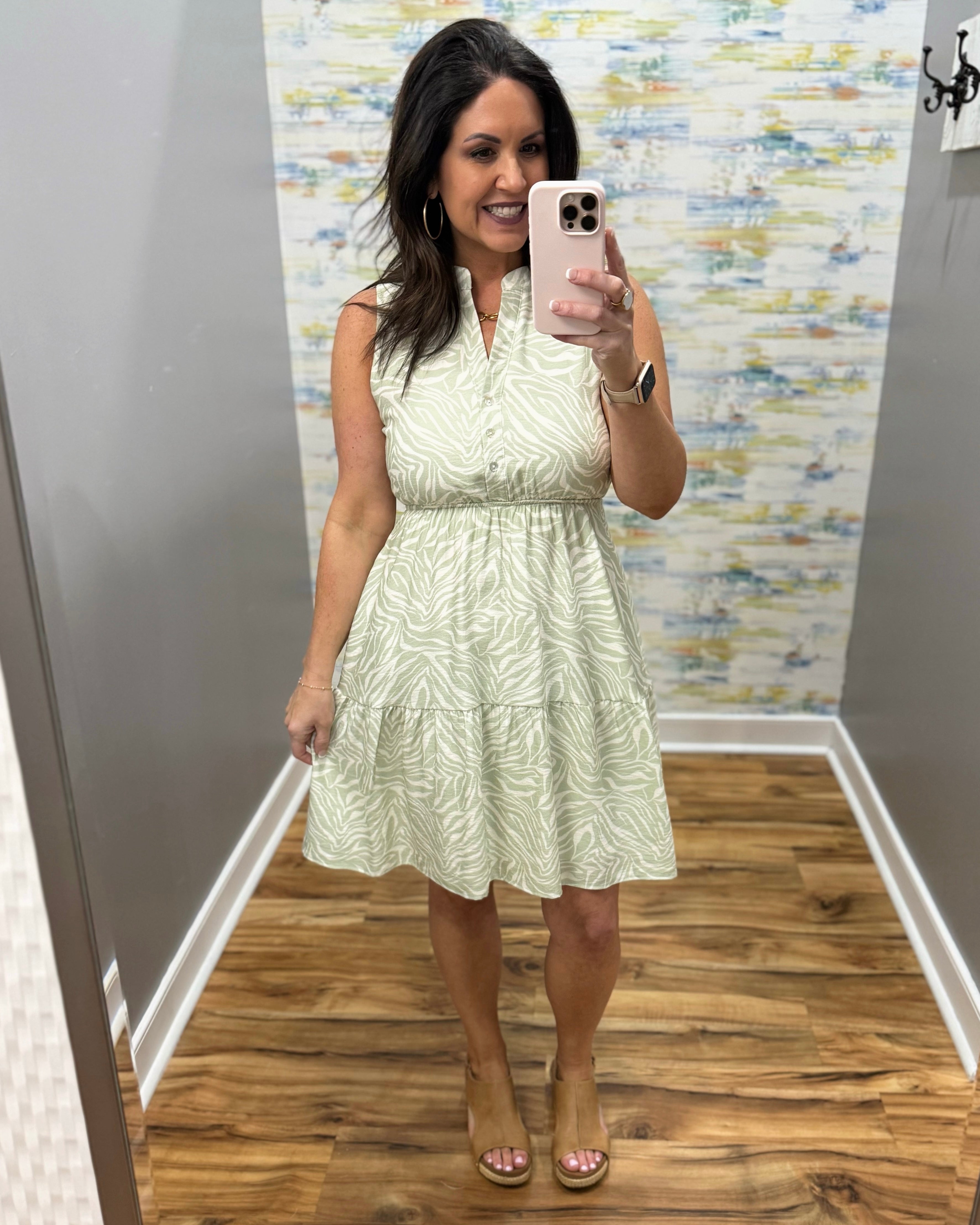 woman in sage tropical dress