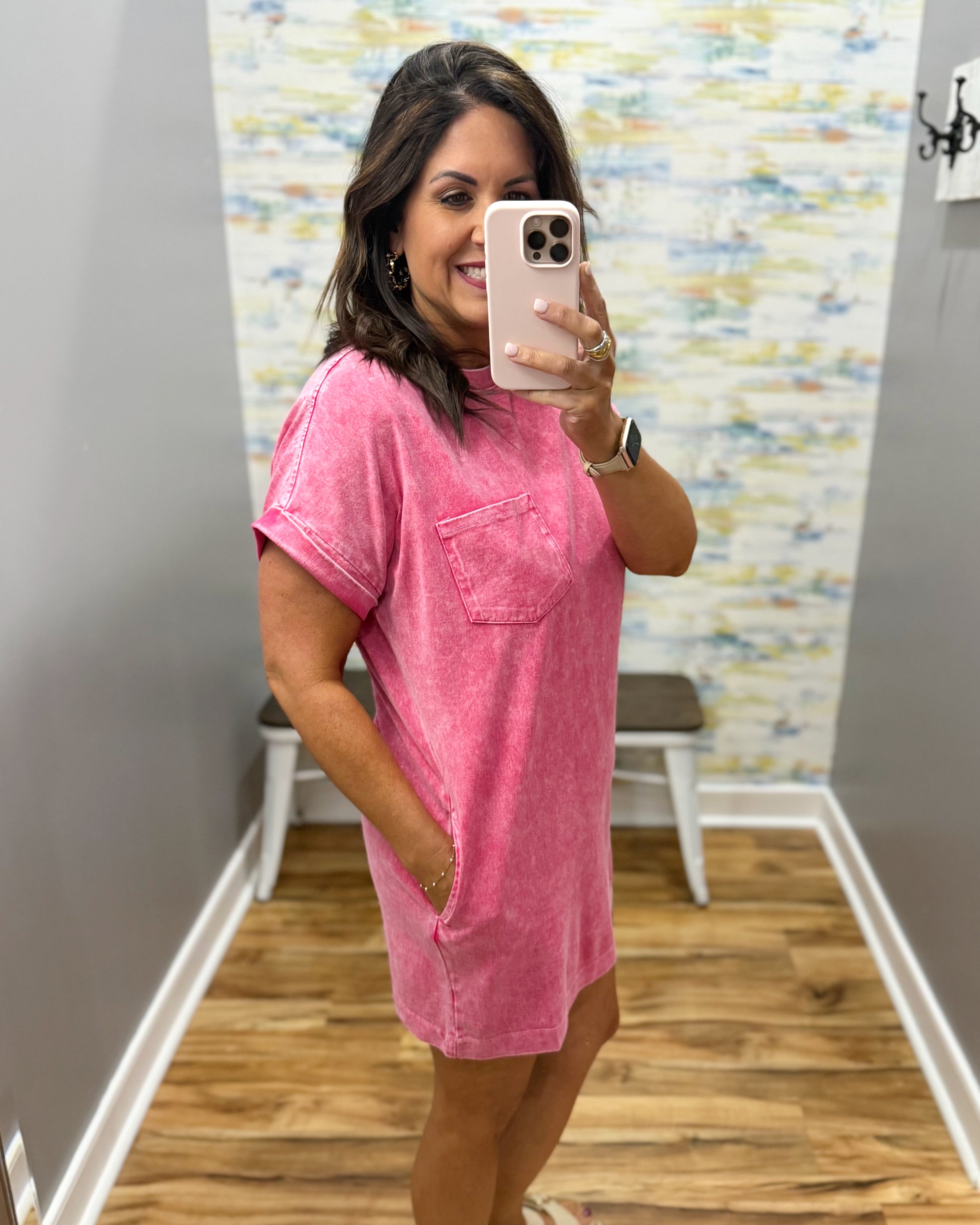 woman wearing red t-shirt dress with sandals. 