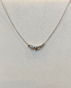 dainty silver nugget necklace.