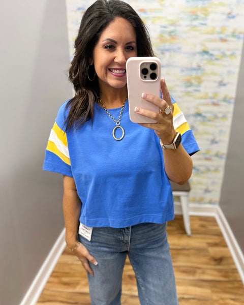 woman wearing blue tee 
