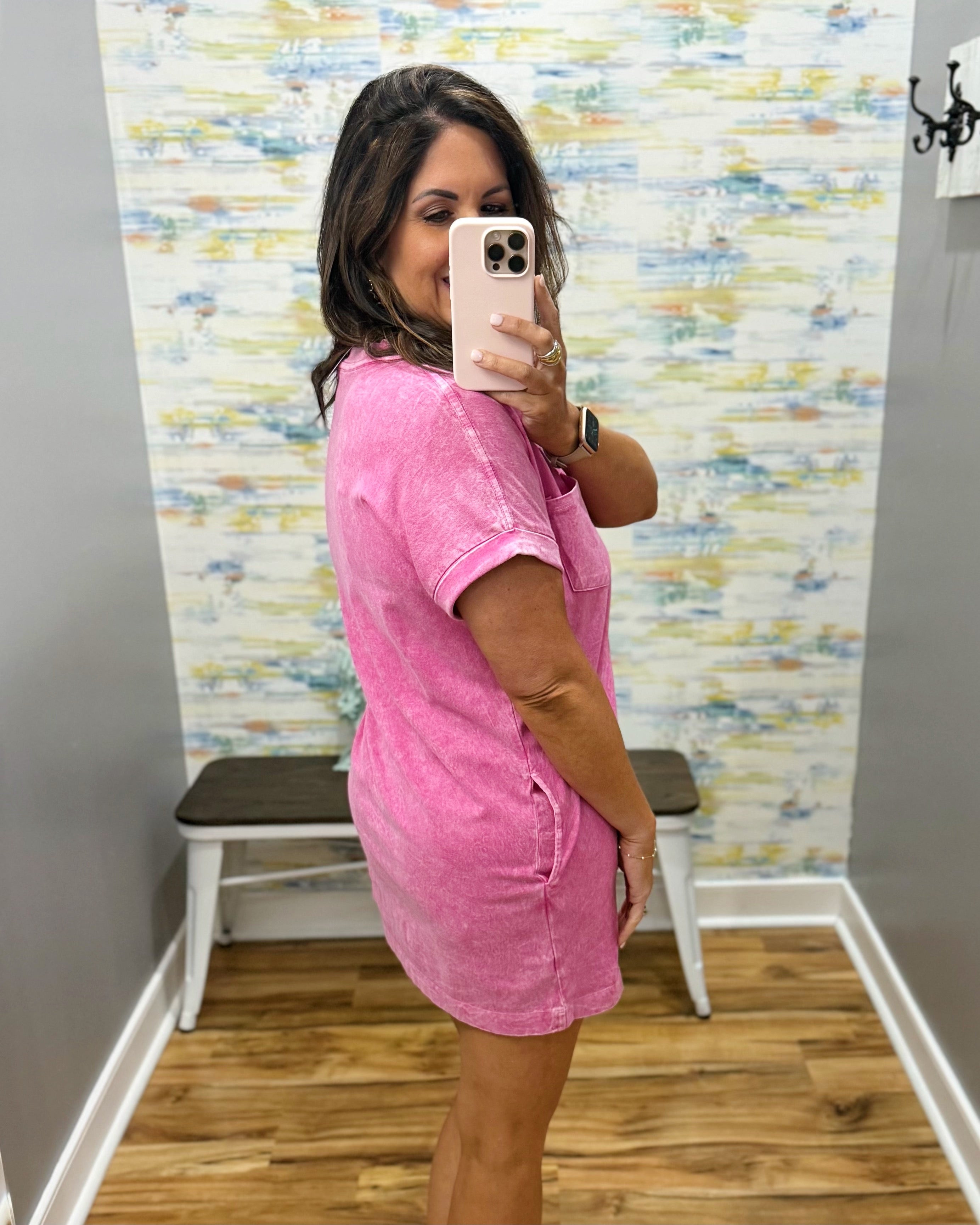woman wearing hot pink t-shirt dress with sandals. 