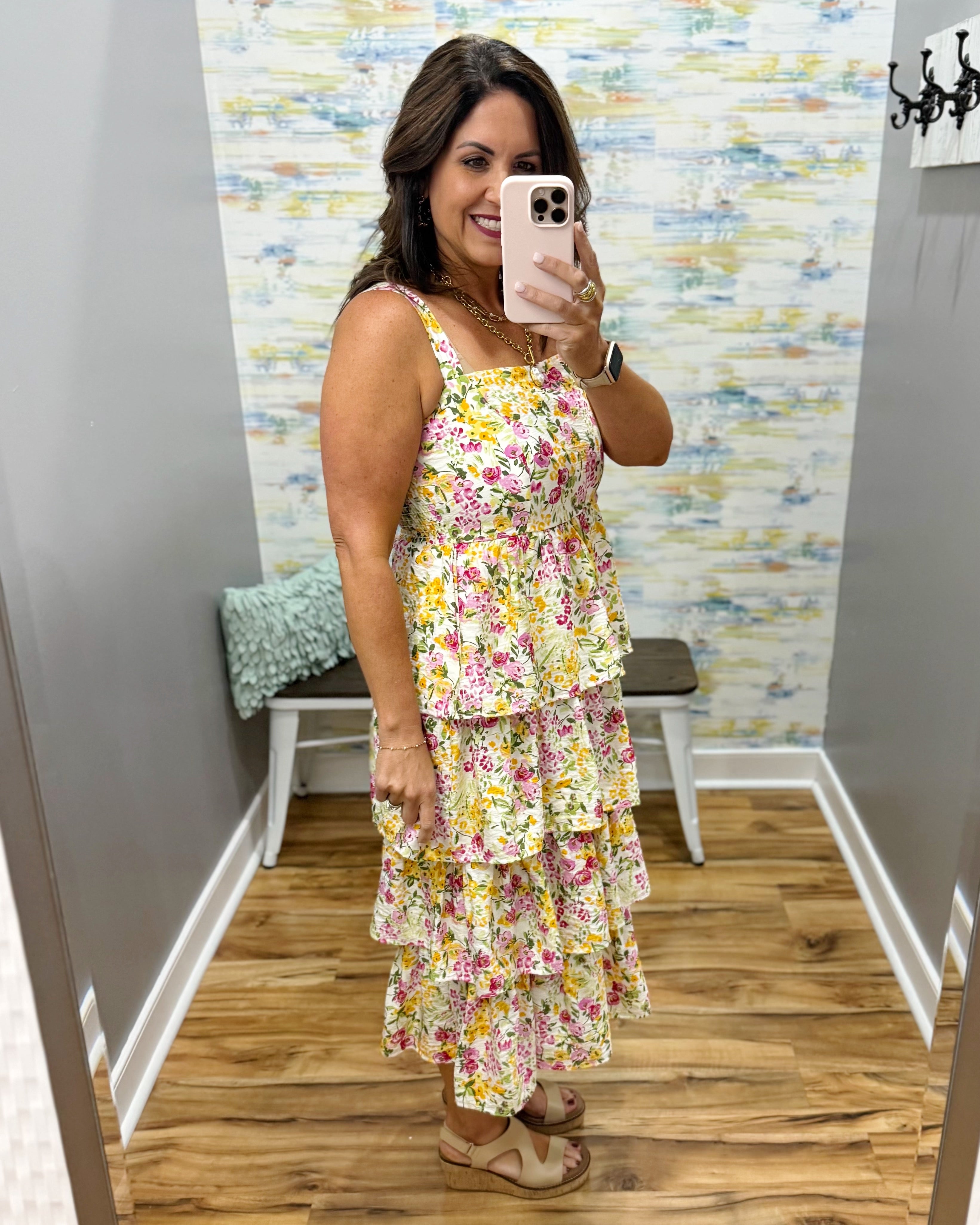 woman wearing floral maxi dress.