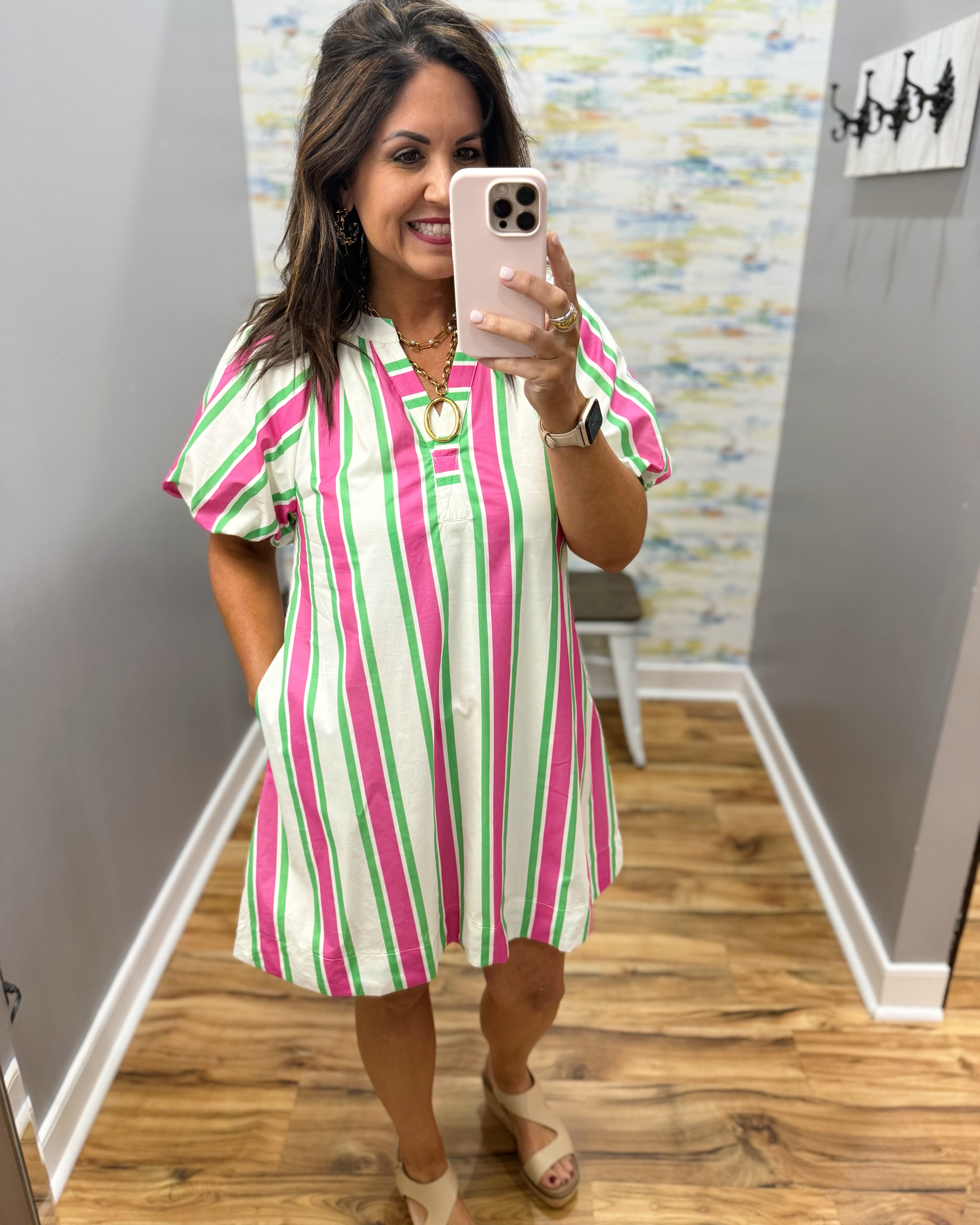 woman wearing a stripe dress.