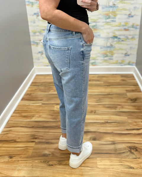 woman wearing Risen Boyfriend style Jeans in a light wash.