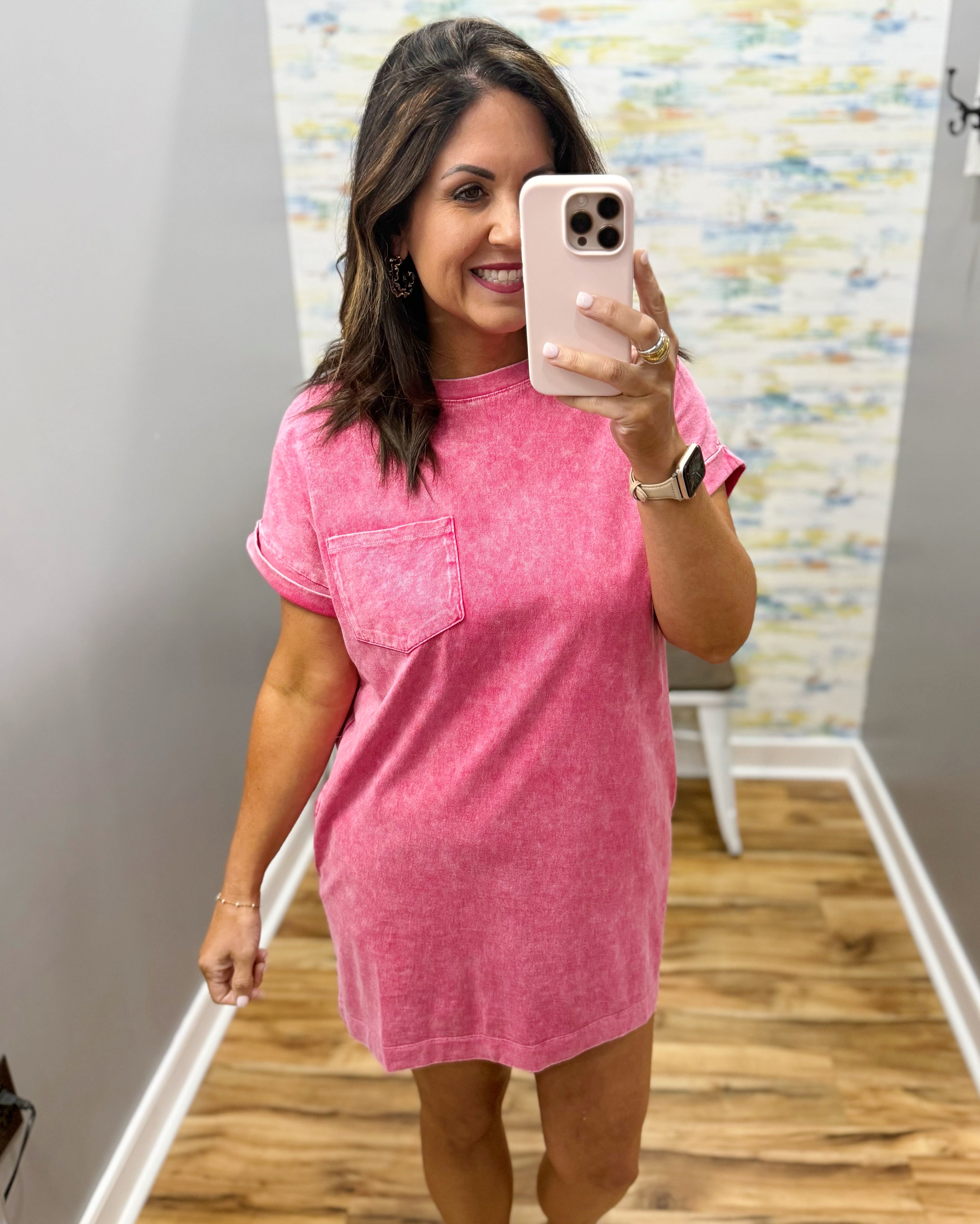 woman wearing red t-shirt dress with sandals. 