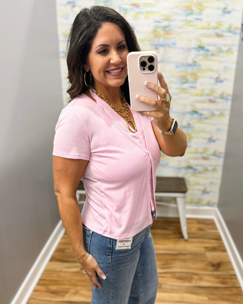 woman wearing pink top
