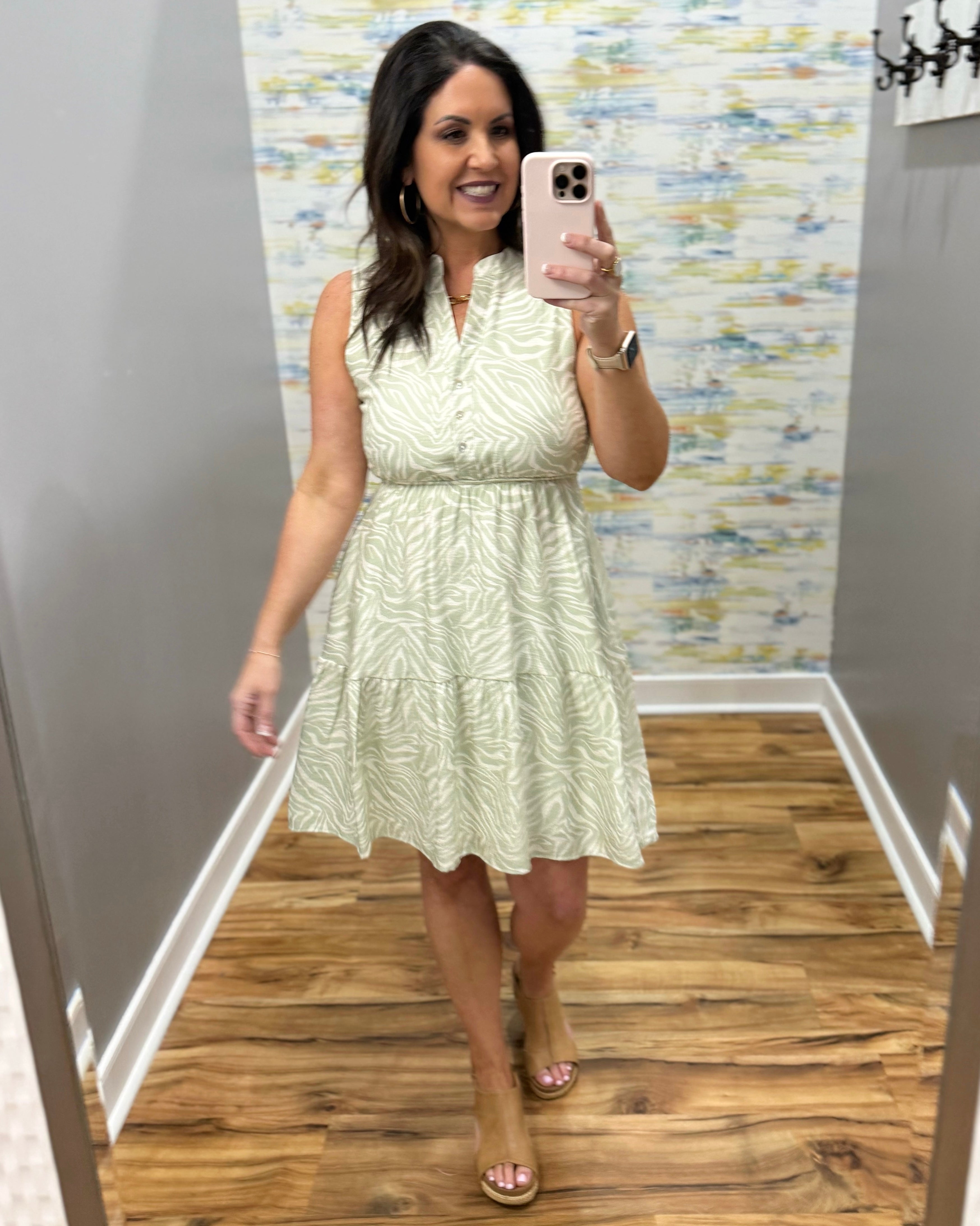 woman in sage tropical dress