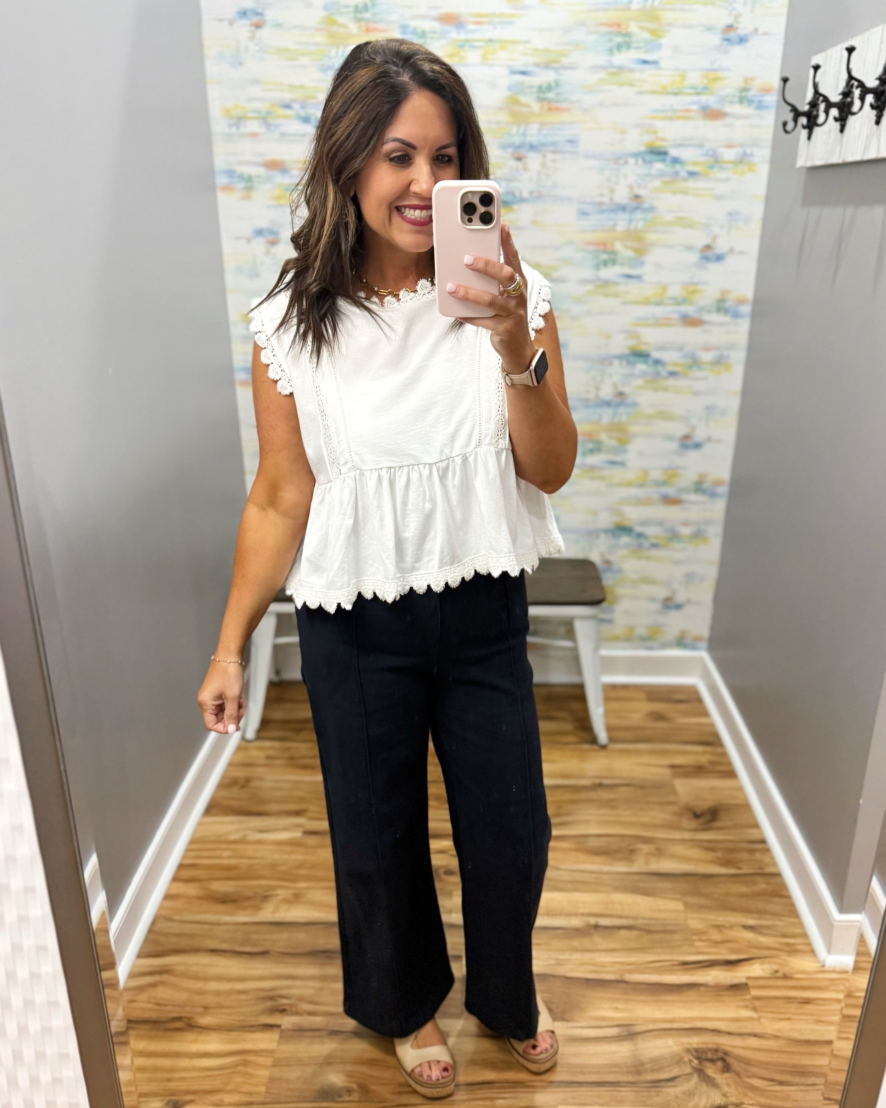 woman wearing navy pants with this top.