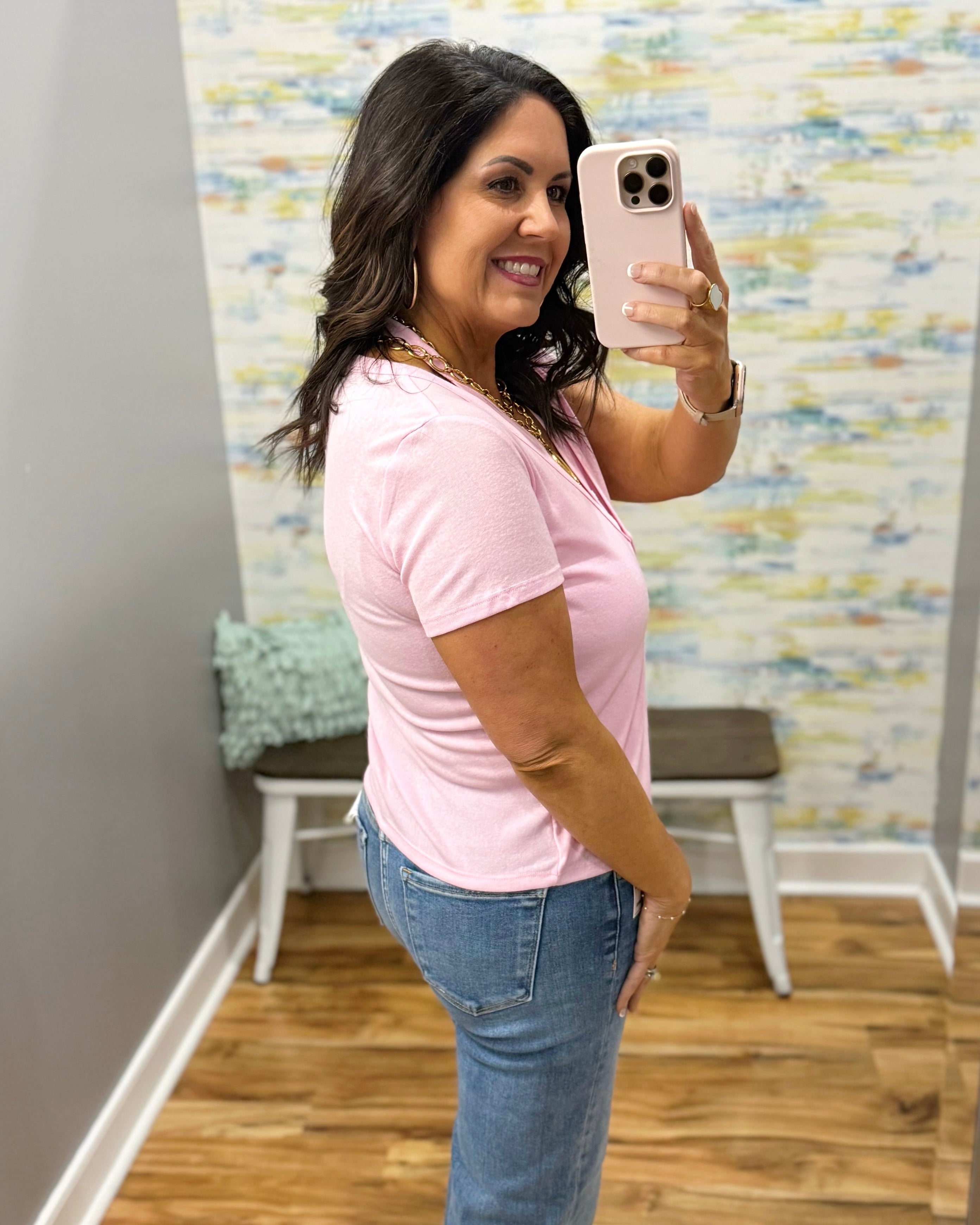 woman wearing pink top